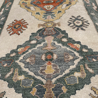 Bayat Oriental Rugs and Restoration logo